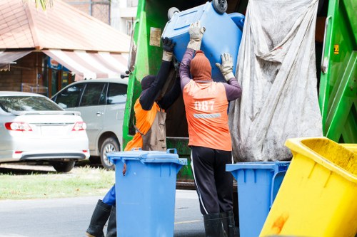 Garden debris being removed by clearance team